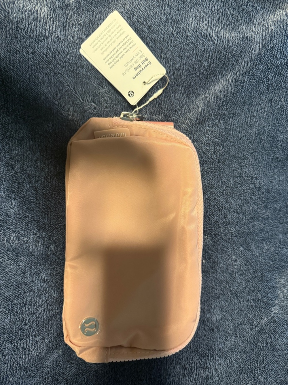 lululemon pink zip pouch with logo accent
